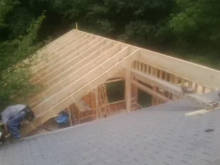Framing a new roof addition that ties into an existing shingle roof in Frankfort